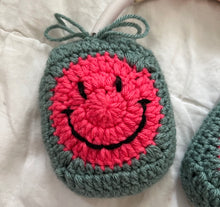 Load image into Gallery viewer, Pink and Green Crochet Smiley Face Headphone Cover
