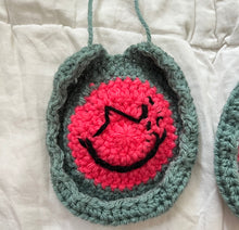 Load image into Gallery viewer, Pink and Green Crochet Smiley Face Headphone Cover

